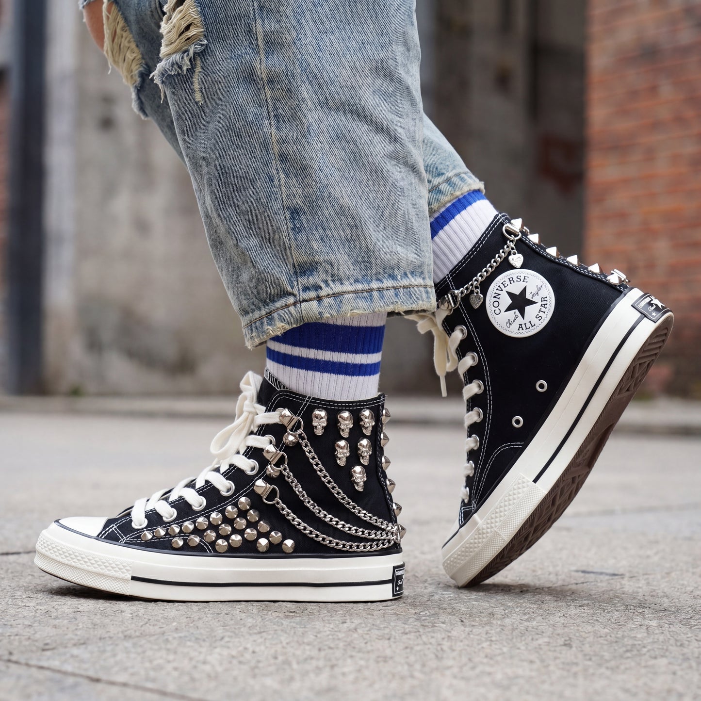 Handmade studded Converse shoes with silver hardware and punk rock style