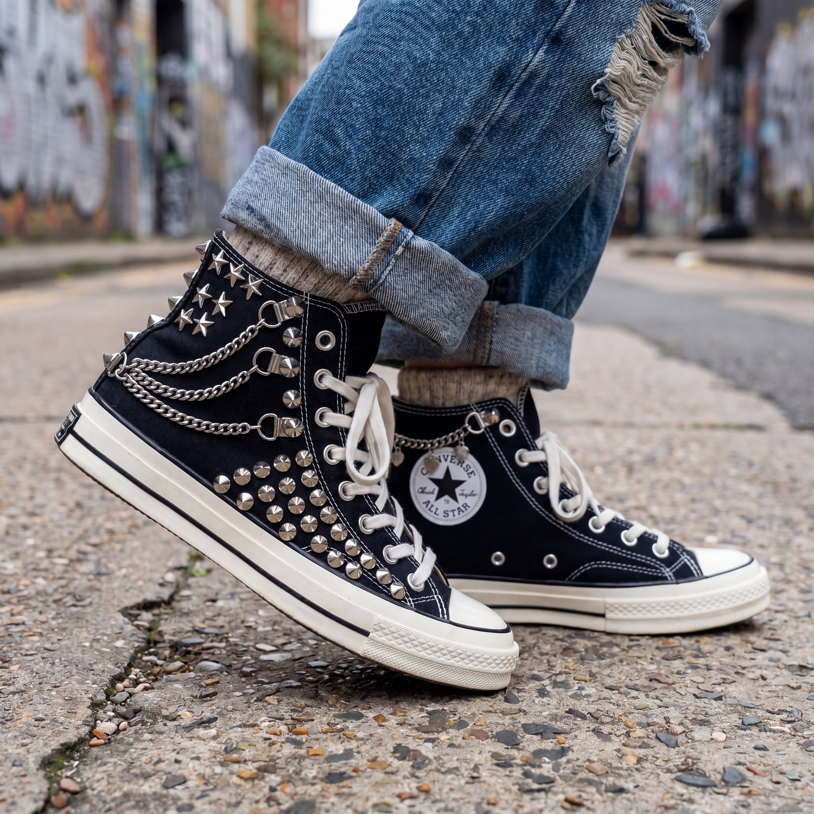Custom studded high top Converse sneakers styled with streetwear outfit