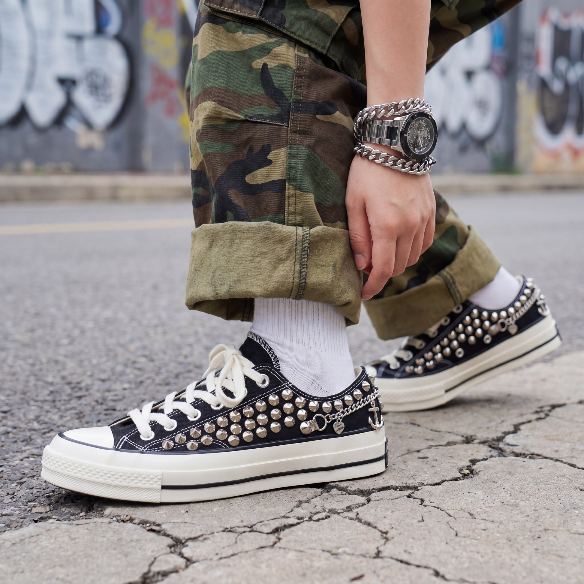 Handmade studded Converse shoes with silver anchor charms and chain accents