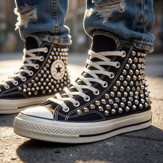 Black studded high top Converse sneakers with silver spikes