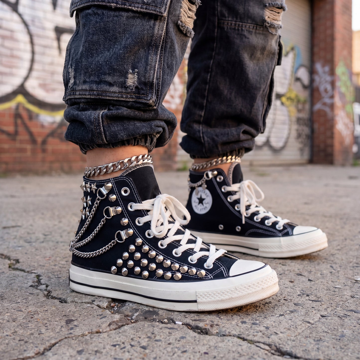 Handmade studded Converse sneakers with silver hardware and punk style
