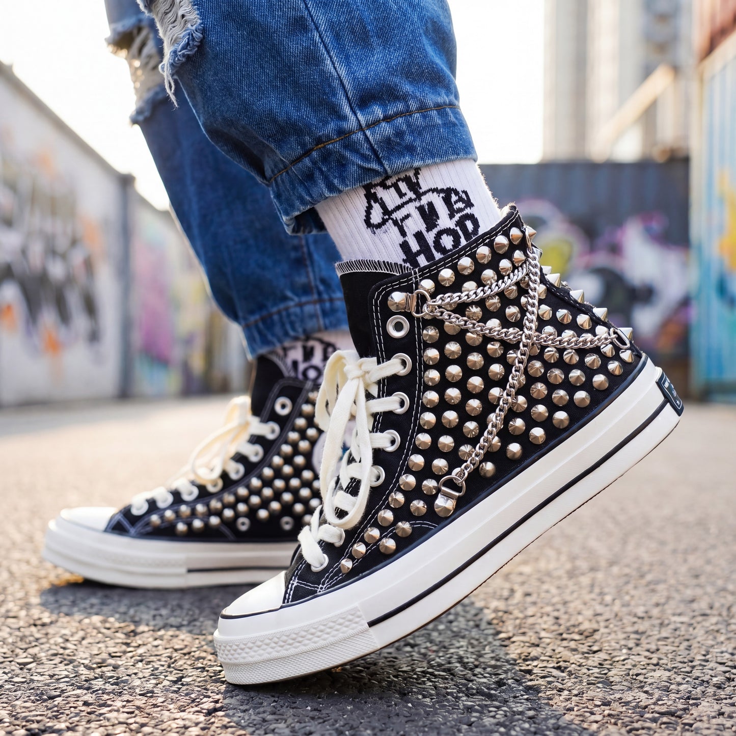 Handmade studded Converse shoes with silver chain accents