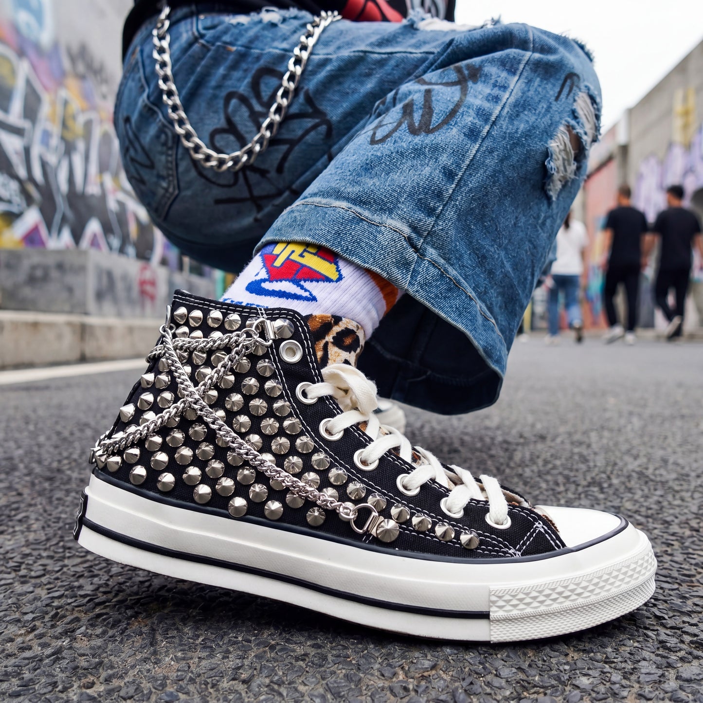 Unisex punk rock Converse shoes with metal studs and leopard print detail