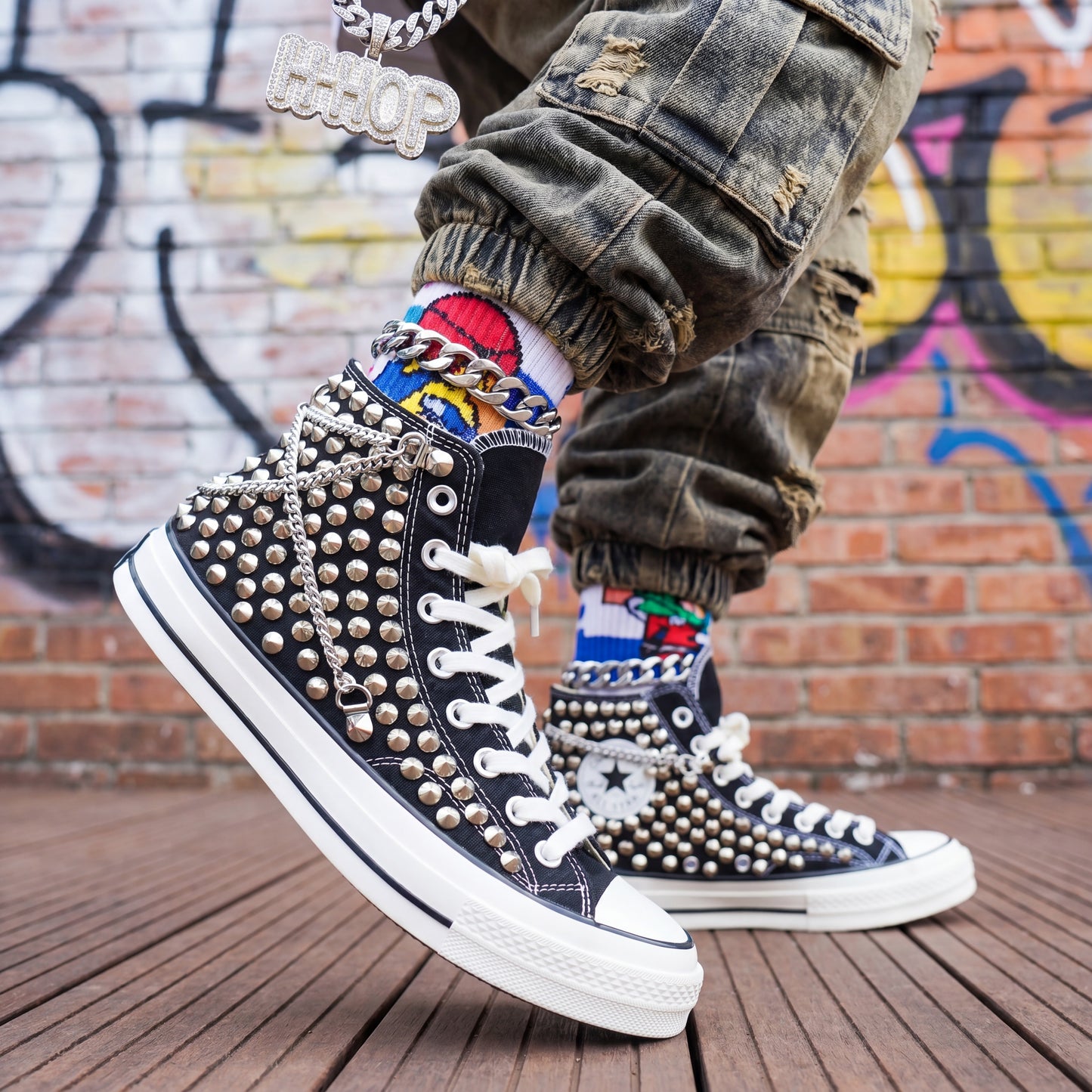 Unisex punk rock Converse shoes with silver hardware and bold street style