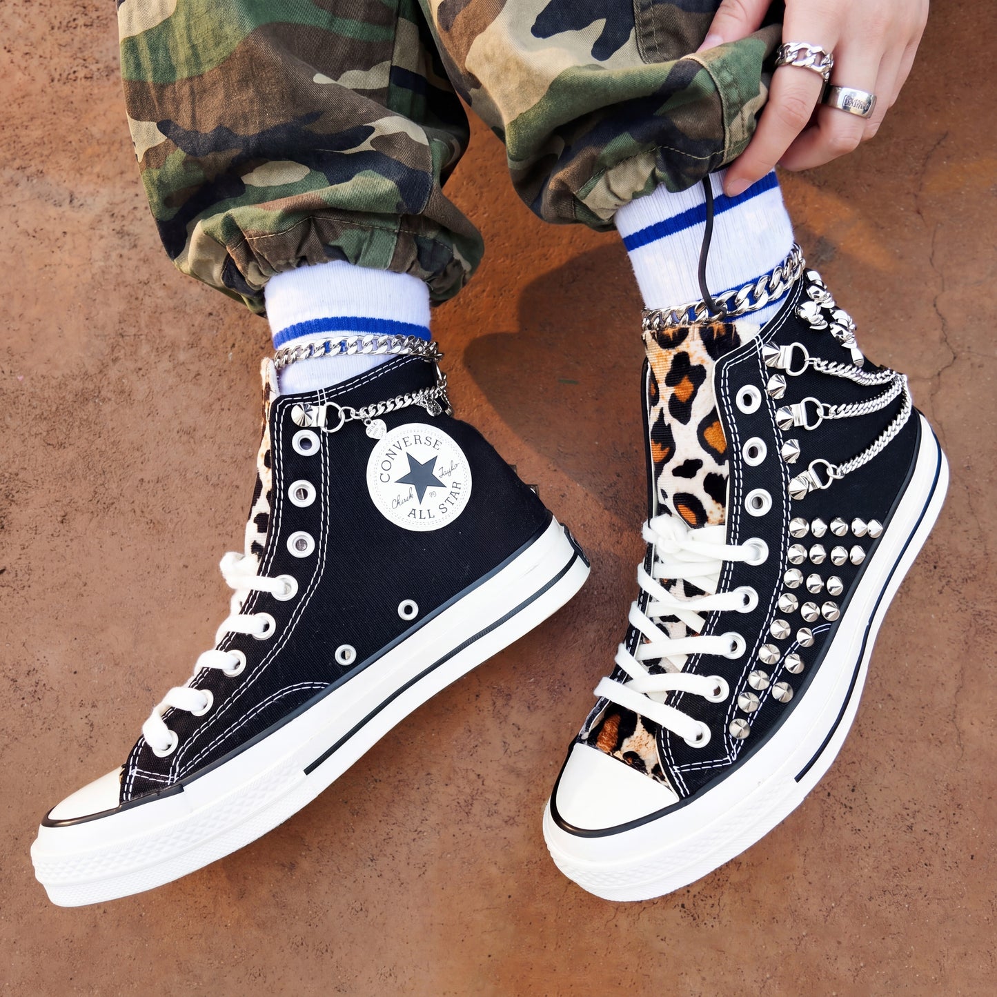 Handmade studded Converse shoes with leopard tongue and silver hardware