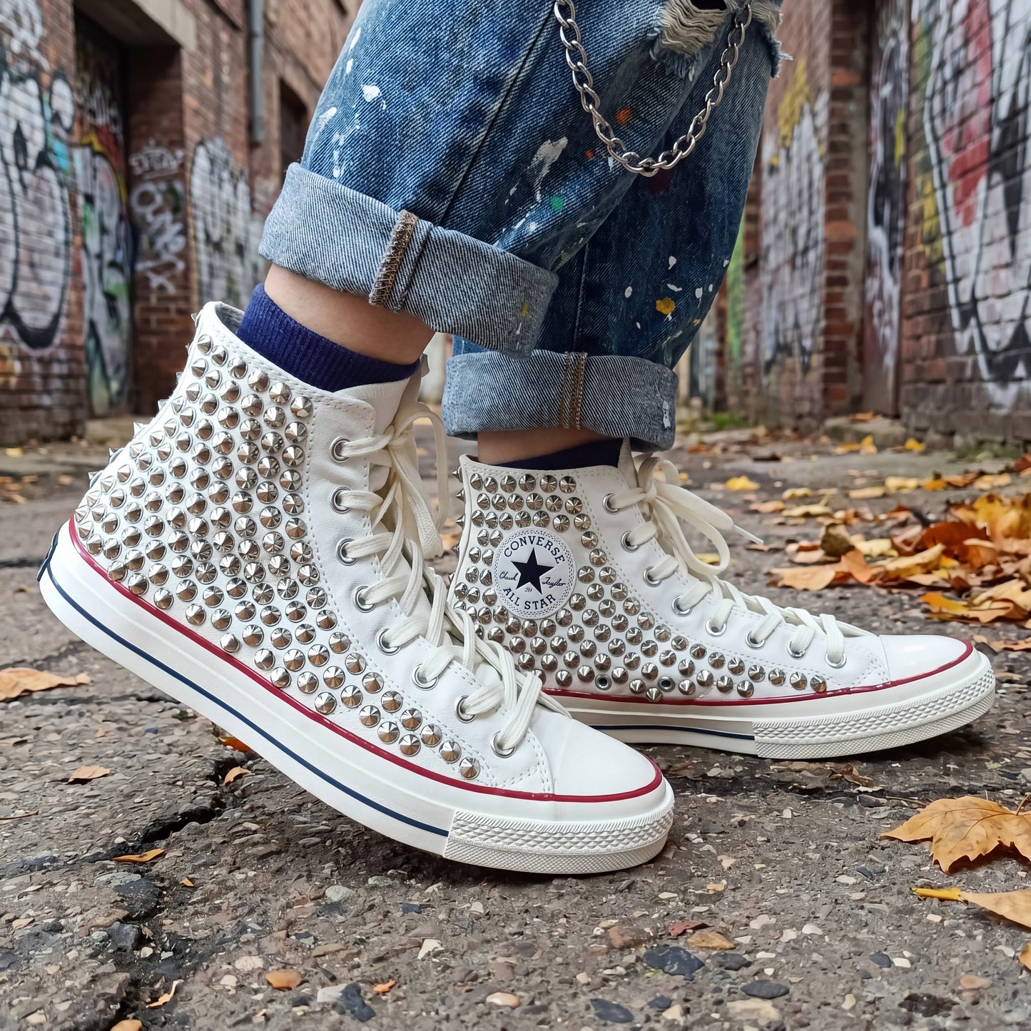 Punk rock white Converse sneakers with silver studded details