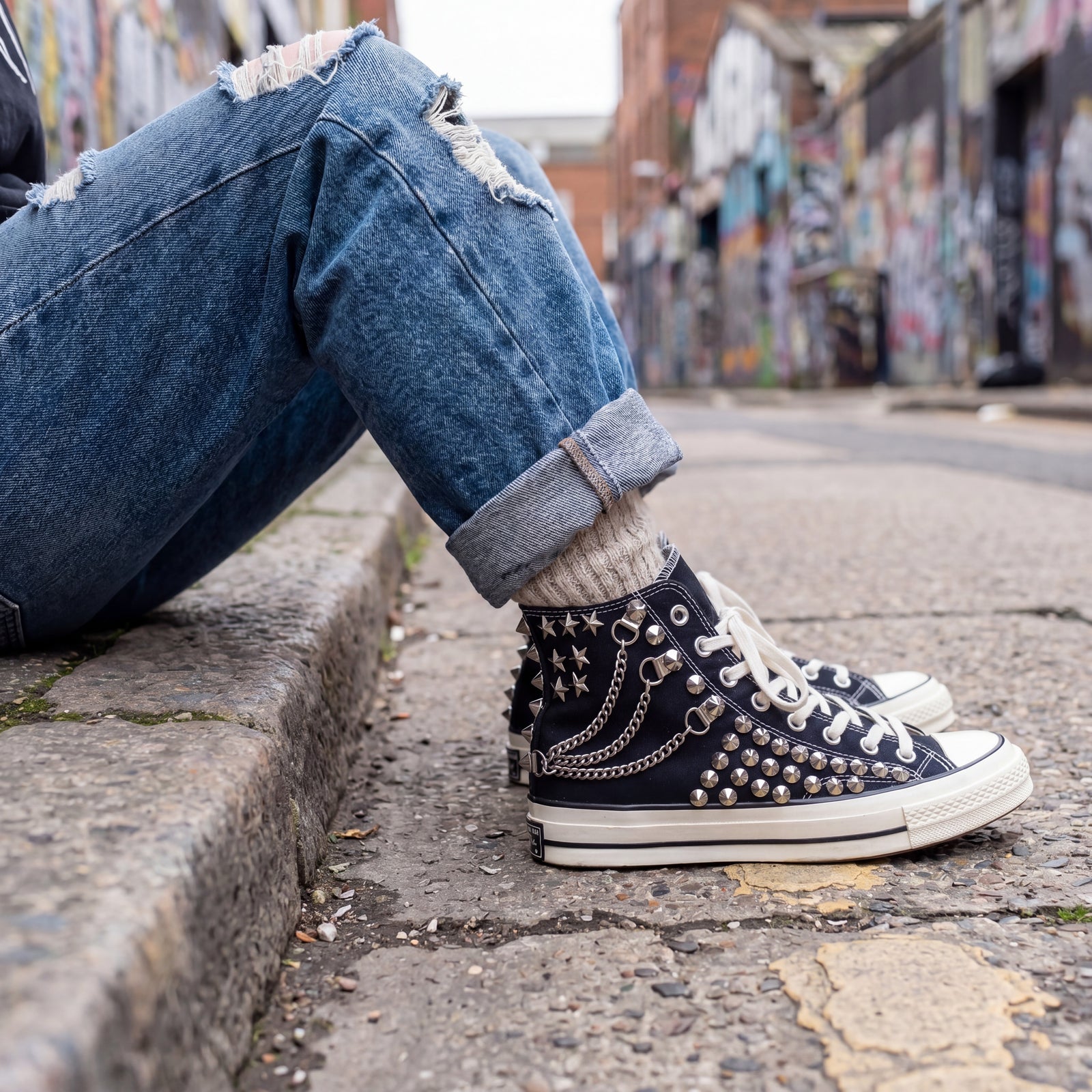 Punk streetwear canvas shoes with black upper, white laces and silver studs