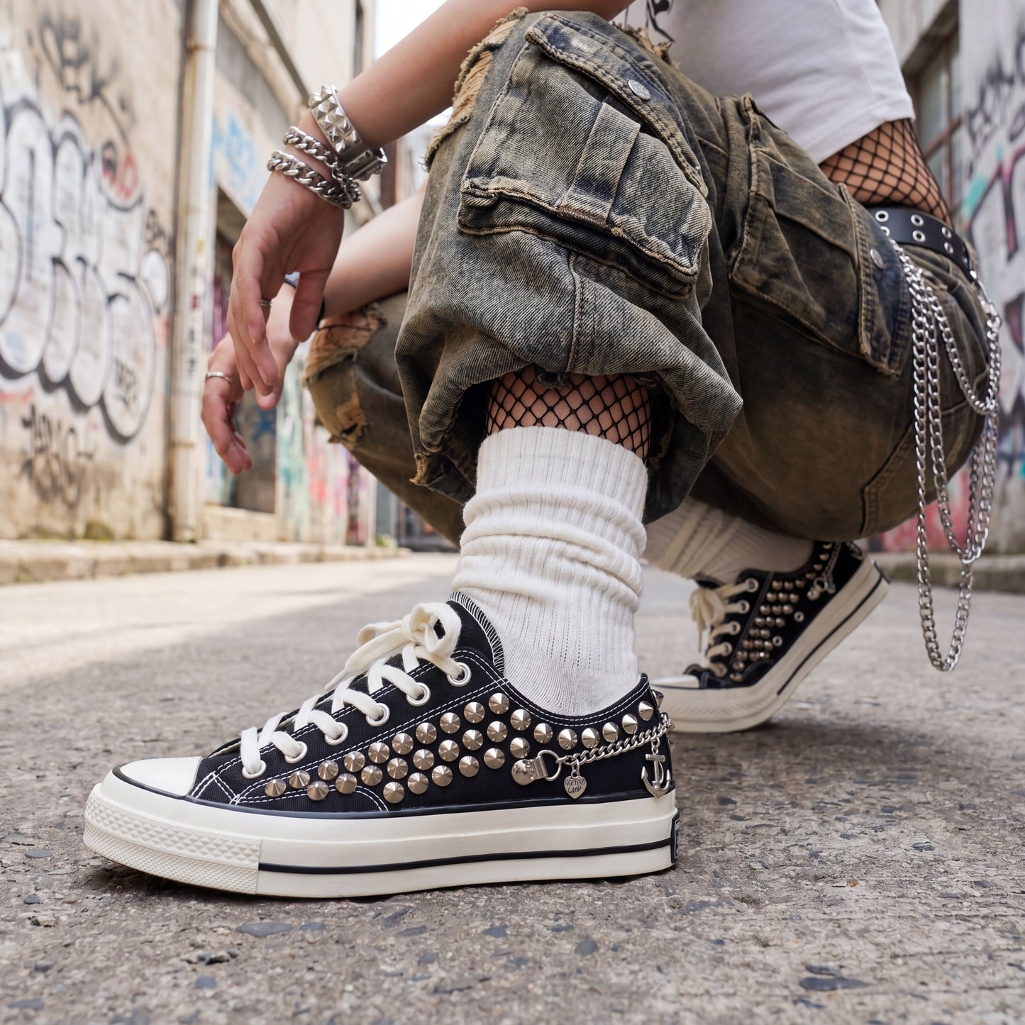 Unisex punk rock Converse shoes with metal studs and anchor embellishments