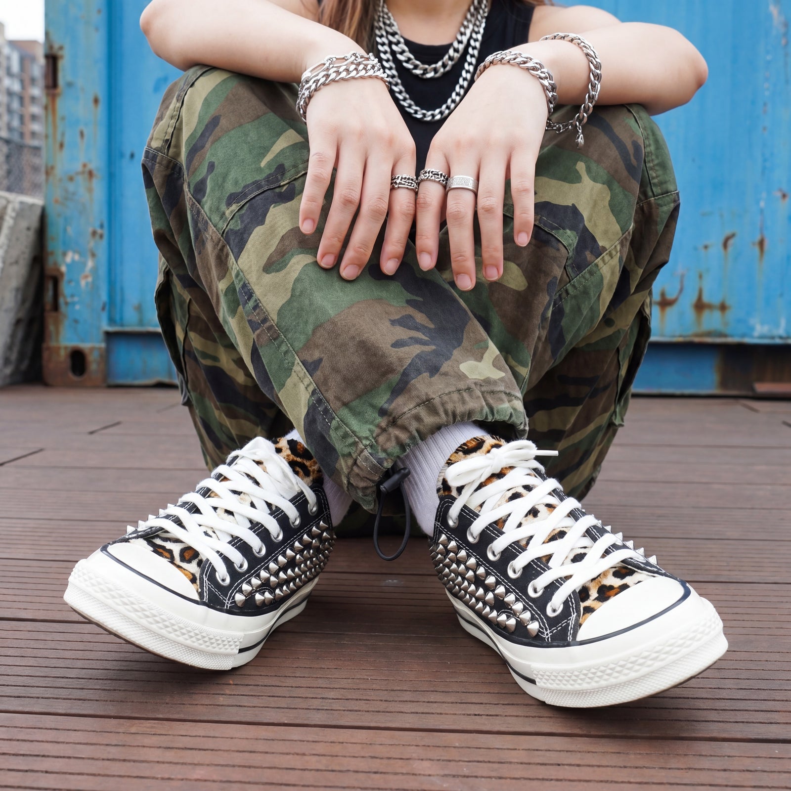Punk rock studded canvas sneakers with leopard print details